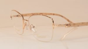 Ferucci 1824 supra style spectacles in rose gold with plastic sides.